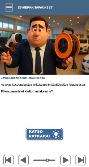 automyyjä pitää kädessään auton latausjohtoa ja jatkojohtokelaa